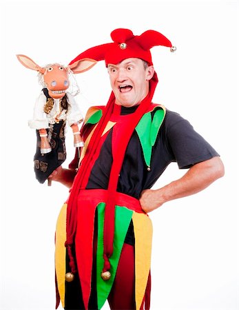 jester - entertaining figure in typical costume with puppet Stock Photo - Budget Royalty-Free & Subscription, Code: 400-06204340