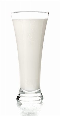 drinking shots - glass full of milk isolated on white Foto de stock - Super Valor sin royalties y Suscripción, Código: 400-06204360