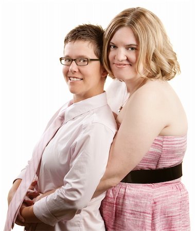 Caucasian lesbian couple embracing over white background Stock Photo - Budget Royalty-Free & Subscription, Code: 400-06204565