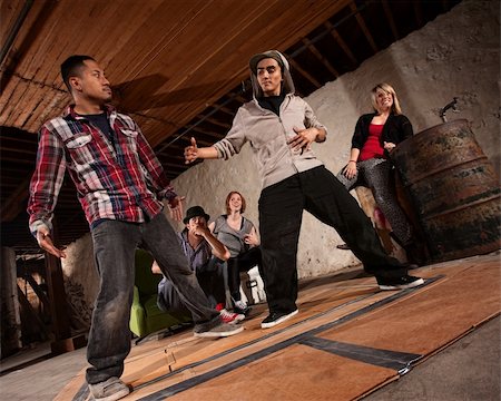 Two handsome Latino men face off in break dancing battle Stock Photo - Budget Royalty-Free & Subscription, Code: 400-06204590