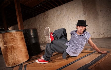 Handsome Mexican man performs break dancing moves Stock Photo - Budget Royalty-Free & Subscription, Code: 400-06204602