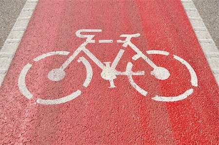 simsearch:400-05151567,k - Bicycle lane sign on red asphalt Photographie de stock - Aubaine LD & Abonnement, Code: 400-06204715