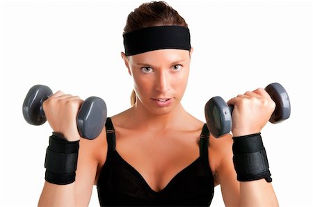 simsearch:400-06480028,k - Woman working out with dumbbells at a gym Stock Photo - Budget Royalty-Free & Subscription, Code: 400-06204744