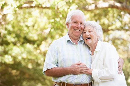 Senior Couple Walking In Park Stock Photo - Budget Royalty-Free & Subscription, Code: 400-06204776