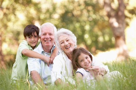 simsearch:400-06205100,k - Grandparents In Park With Grandchildren Stock Photo - Budget Royalty-Free & Subscription, Code: 400-06204799