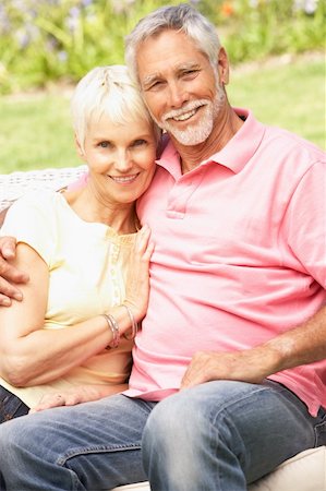 Senior Couple Relaxing In Garden Stock Photo - Budget Royalty-Free & Subscription, Code: 400-06205069
