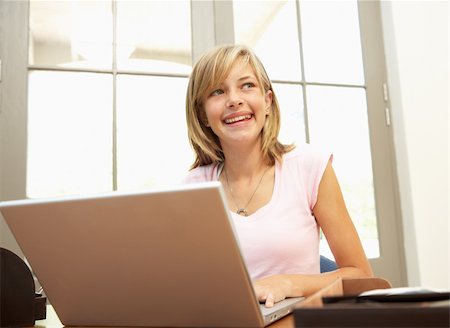 simsearch:400-04044137,k - Teenage Girl Using Laptop At Home Stock Photo - Budget Royalty-Free & Subscription, Code: 400-06205152