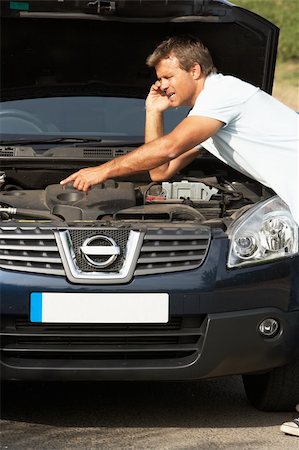 Driver Broken Down On Country Road Foto de stock - Super Valor sin royalties y Suscripción, Código: 400-06205238