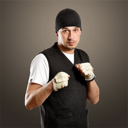 Fight for your rights concept. Man in boxing position, looking on camera, Stock Photo - Budget Royalty-Free & Subscription, Code: 400-06205333