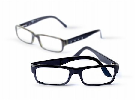 simsearch:400-04855630,k - Pair of classic eye glasses, shallow DOF Foto de stock - Royalty-Free Super Valor e Assinatura, Número: 400-06205450