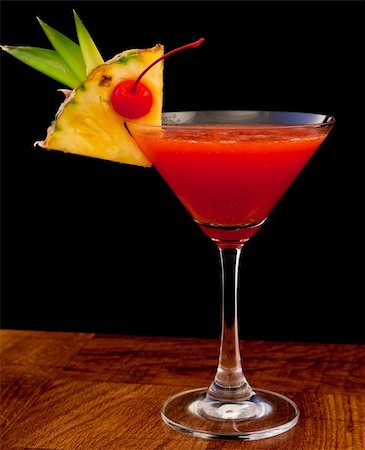 simsearch:400-06797125,k - tropical cocktail isolated on a black background served on a bar top Stock Photo - Budget Royalty-Free & Subscription, Code: 400-06206060