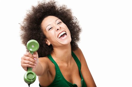 Afro-American young woman answering a call, isolated on white background Stock Photo - Budget Royalty-Free & Subscription, Code: 400-06206160