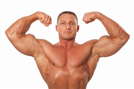 Attractive male body builder, demonstrating contest pose, isolated on white background Stock Photo - Budget Royalty-Free & Subscription, Code: 400-06206497