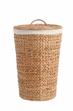 Isolated on white laundry basket made of rattan Stockbilder - Microstock & Abonnement, Bildnummer: 400-06206663