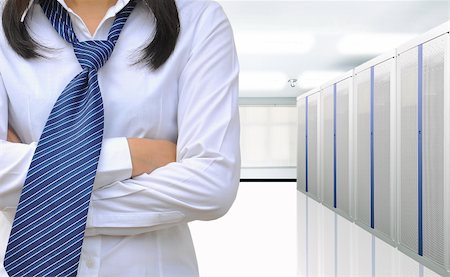 server room managers - working women in the communication and internet network server room Stock Photo - Budget Royalty-Free & Subscription, Code: 400-06206881