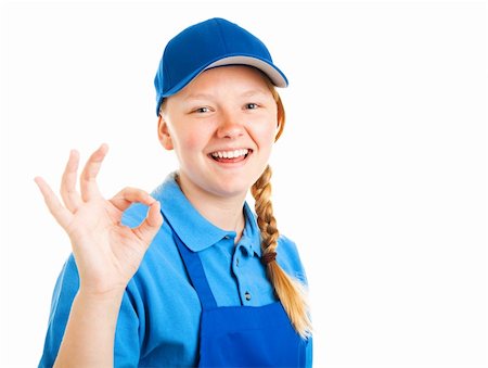 Pretty blond teenage girl in a work uniform, giving the okay sign.  Isolated on white. Stock Photo - Budget Royalty-Free & Subscription, Code: 400-06206965
