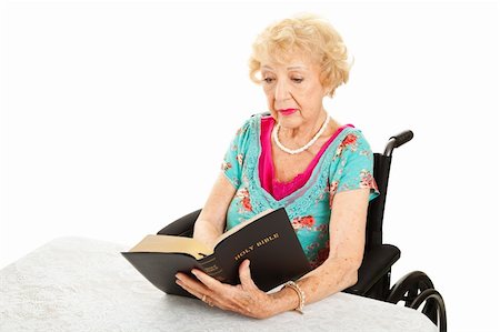 simsearch:400-06333333,k - Disabed senior woman in wheelchair, reading her bible.  Isolated on white. Foto de stock - Super Valor sin royalties y Suscripción, Código: 400-06206968