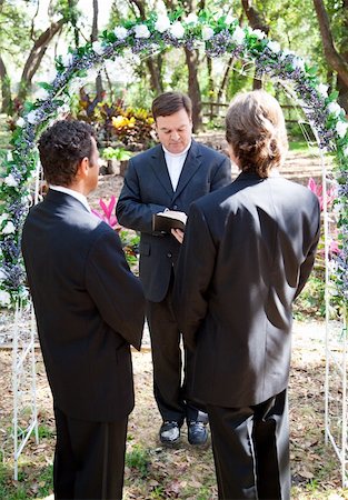 Gay couple being married by their minister outdoors under a floral archway. Stock Photo - Budget Royalty-Free & Subscription, Code: 400-06206974