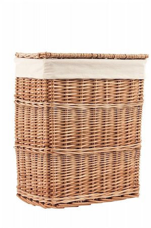 Isolated on white laundry basket made of rattan Stockbilder - Microstock & Abonnement, Bildnummer: 400-06207624