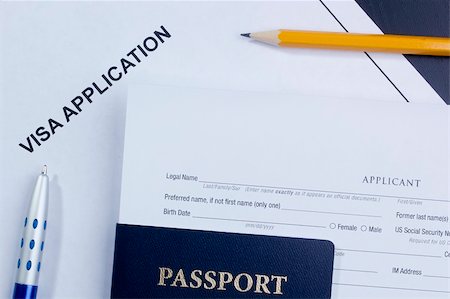 Directly above photograph of an application for a visa. Foto de stock - Super Valor sin royalties y Suscripción, Código: 400-06207980