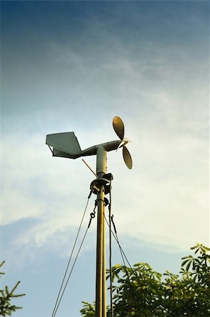 science station - A windmill style of anemometer - such weather monitoring devices as tje anemometer was developed in 1926 and remains widely used for the wind speed measurements. Useful file for your brochure about weather, ecology and other media needs Stock Photo - Budget Royalty-Free & Subscription, Code: 400-06200644