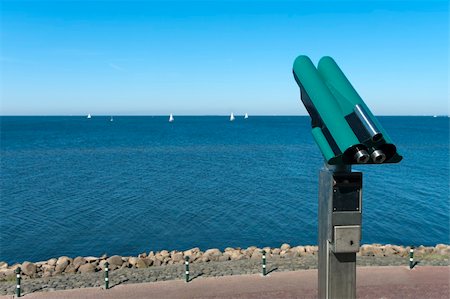 telescope at the border of a lake Stock Photo - Budget Royalty-Free & Subscription, Code: 400-06201626
