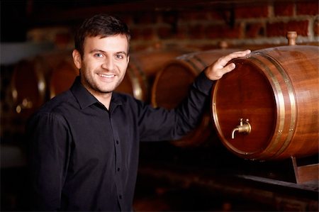 Sommelier and wine from the barrel Stock Photo - Budget Royalty-Free & Subscription, Code: 400-06201657