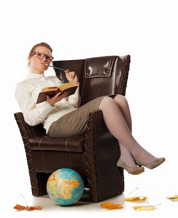 funny office chairs pictures - pretty female teacher sitting in armchair Stock Photo - Budget Royalty-Free & Subscription, Code: 400-06201668