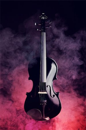 Elegant black violin in smoke on red and black background Stock Photo - Budget Royalty-Free & Subscription, Code: 400-06201678