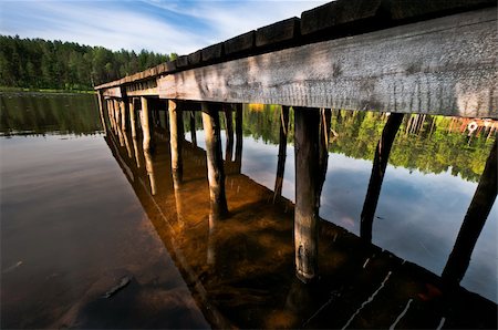 dmitryelagin (artist) - Hand made pier on lake close up, beautiful landscape and reflection Stock Photo - Budget Royalty-Free & Subscription, Code: 400-06202092
