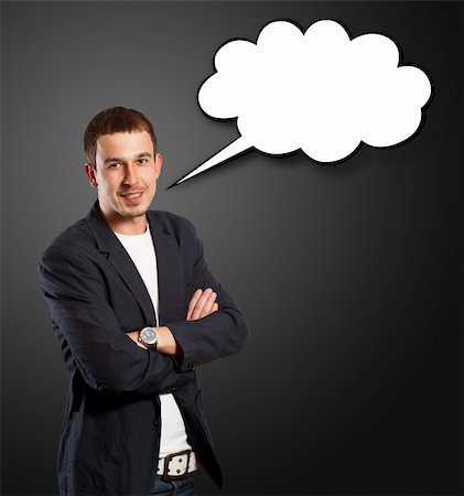 Business man with speech bubble, looking on camera Stock Photo - Budget Royalty-Free & Subscription, Code: 400-06202469