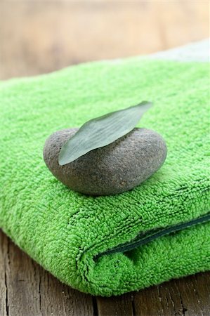 petal on stone - green towel, stone and leaf - Zen Concept Stock Photo - Budget Royalty-Free & Subscription, Code: 400-06202480
