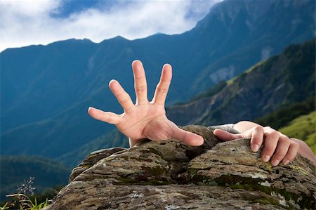 hand for help on the mountain Stock Photo - Budget Royalty-Free & Subscription, Code: 400-06202895