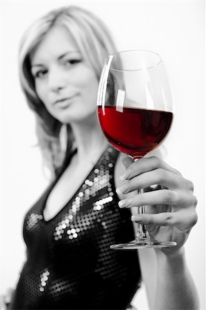 simsearch:400-04629496,k - Attractive young woman with glass of red wine Photographie de stock - Aubaine LD & Abonnement, Code: 400-06203028