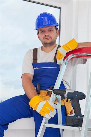 Contented worker on well deserved break resting by the window Stock Photo - Budget Royalty-Free & Subscription, Code: 400-06203091