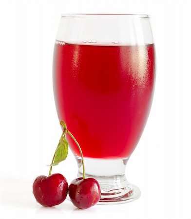 Fresh cold drink with cherry against white background Foto de stock - Super Valor sin royalties y Suscripción, Código: 400-06203302