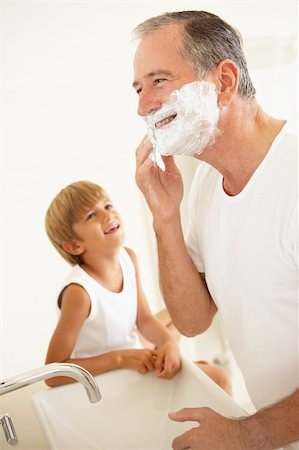 Grandson Watching Grandfather Shaving In Bathroom Mirror Stock Photo - Budget Royalty-Free & Subscription, Code: 400-06203542