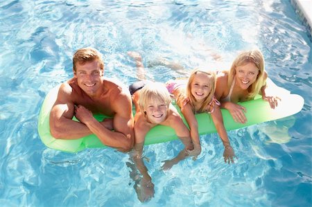 pools interior exterior - Family Outside Relaxing In Swimming Pool Stock Photo - Budget Royalty-Free & Subscription, Code: 400-06203996