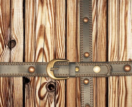 Grunge background. Old wooden boards and leather belt Photographie de stock - Aubaine LD & Abonnement, Code: 400-06327040