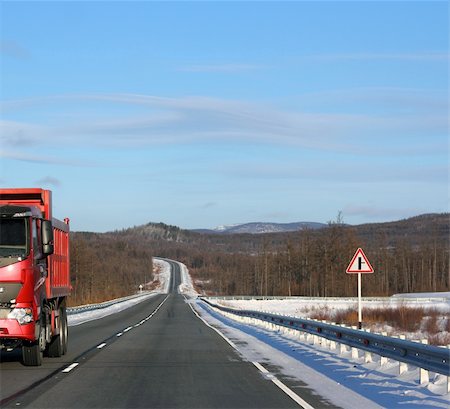 The red truck on a winter road. Stock Photo - Budget Royalty-Free & Subscription, Code: 400-06327975