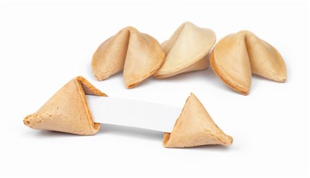 Broken fortune cookie with fortune paper in front of a few other cookies isolated on white. Foto de stock - Royalty-Free Super Valor e Assinatura, Número: 400-06328060