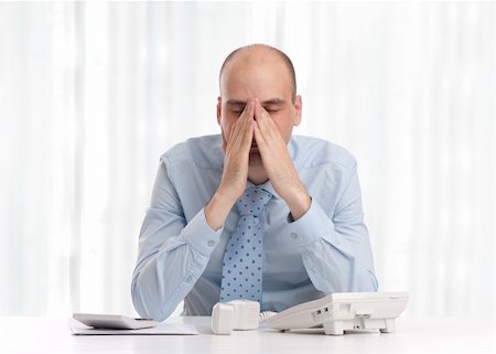 tired businessman at work Stock Photo - Budget Royalty-Free & Subscription, Code: 400-06328302