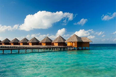 simsearch:400-05742448,k - Row of water villas in the Maldives Stock Photo - Budget Royalty-Free & Subscription, Code: 400-06328738