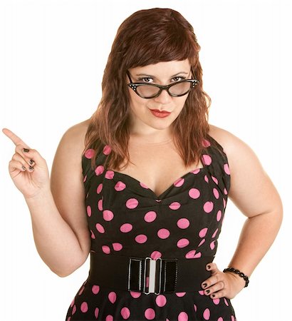 passionate fat pic - Woman in pink polka dot dress with attitude Stock Photo - Budget Royalty-Free & Subscription, Code: 400-06328777