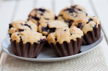 simsearch:400-07034479,k - Close-up on delicious and healthy home-made blueberry muffins Stock Photo - Budget Royalty-Free & Subscription, Code: 400-06328906