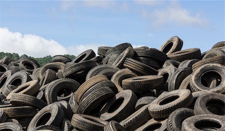 scrap yard pile of cars - Heap of old Tires  in recycling plant in Thailand Stock Photo - Budget Royalty-Free & Subscription, Code: 400-06329154