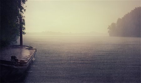 rain on the lake and old boat photo Stock Photo - Budget Royalty-Free & Subscription, Code: 400-06329925