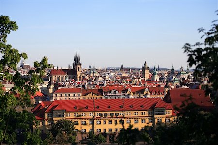 simsearch:400-06526519,k - View of red roofs and high gothic towers between green leaves. Prague, Czech Republic Stock Photo - Budget Royalty-Free & Subscription, Code: 400-06330005