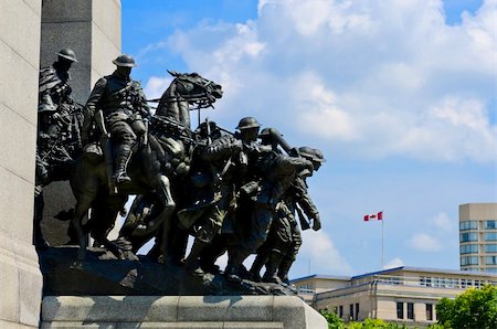 The National War Memorial (also known as The Response), is a granite cenotaph with bronze sculptures, that stands in Confederation Square, Ottawa, Canada and serves as the federal war memorial for Canada. Foto de stock - Super Valor sin royalties y Suscripción, Código: 400-06330046