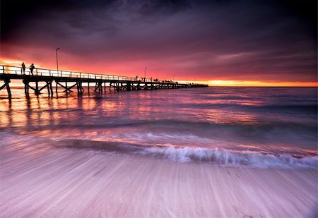 Beautiful Sunset at Semaphore Beach, South Australia Foto de stock - Super Valor sin royalties y Suscripción, Código: 400-06330169